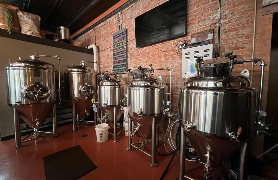 Stainless steel brewing tanks inside The UrbanWoody Brewery